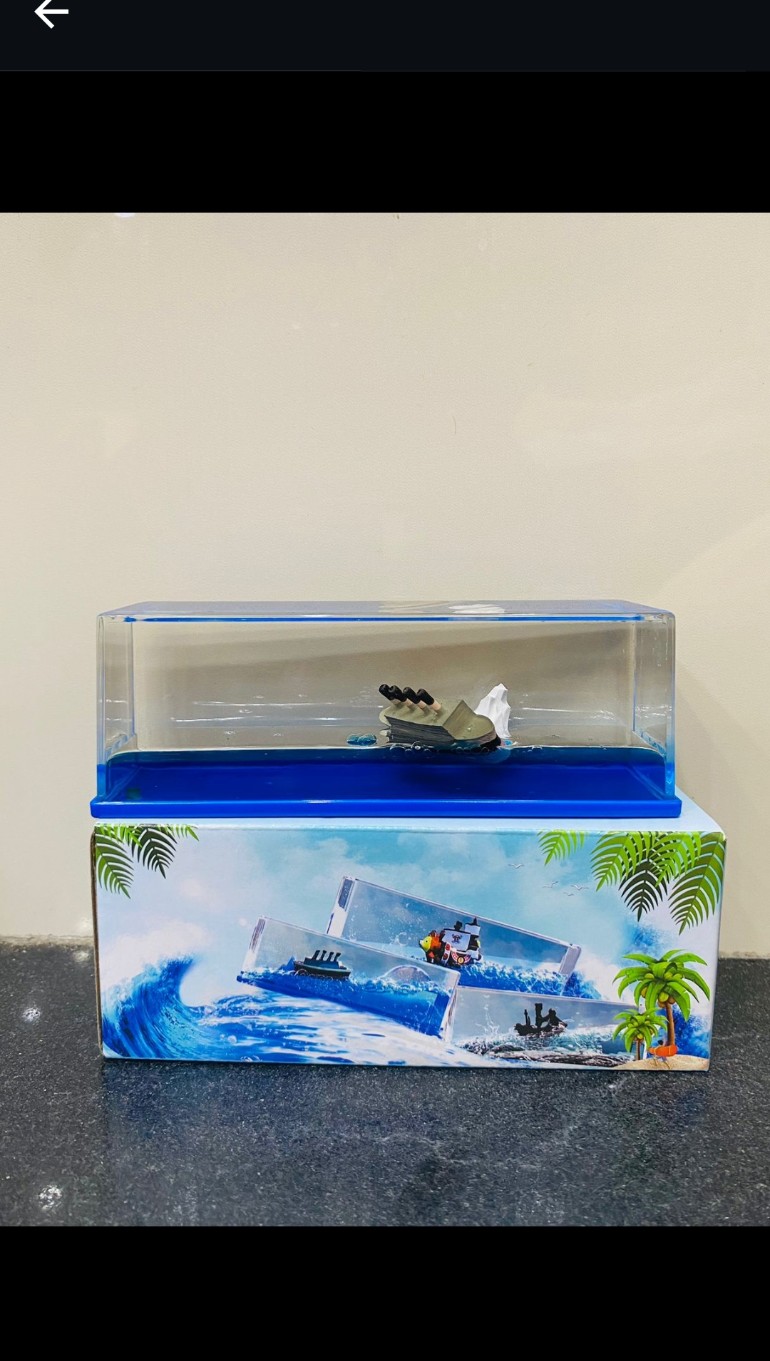Titanic liquid dashboard showpiece in a clear case